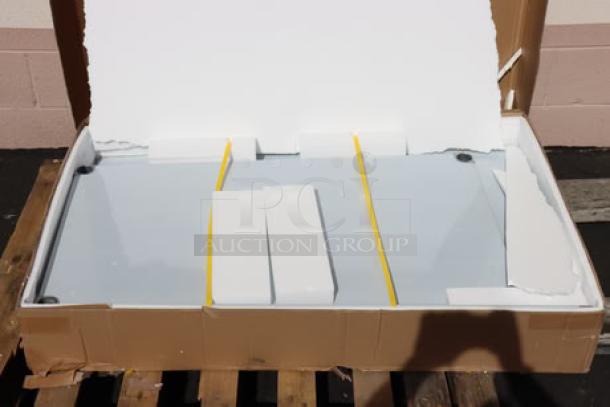 Regency 30"x48" stainless steel work table, model 600TSB3048S, in open packaging with minor scuffs/dings possible.