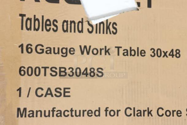 Brand new Regency 30" x 48" stainless steel work table, model 600TSB3048S, with damaged packaging.