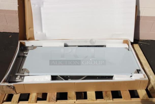 Brand new Regency FWT-3060-US-418 30"x60" folding stainless steel work table with removable undershelf, original packaging damaged.