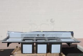 Brand new Regency Spec Line PCS3C162014-24LR commercial sink, 100" stainless steel, 3 compartments, 2 drainboards, dented backsplash.