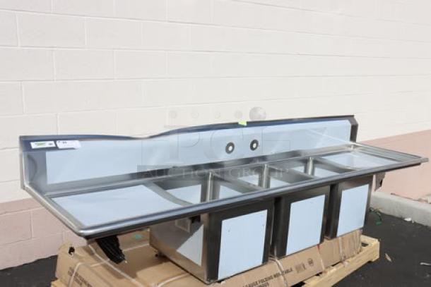 Regency Spec Line PCS3C162014-24LR stainless steel sink, 3 compartments, 2 drainboards, dented backsplash.