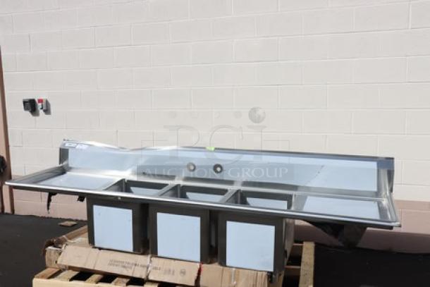 Regency Spec Line PCS3C162014-24LR stainless steel sink, 3 compartments, 2 drainboards, dented backsplash, new.