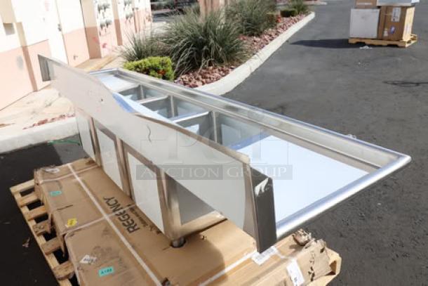 Regency Spec Line PCS3C162014-24LR 100" stainless steel sink with 3 compartments, 2 drainboards; dented backsplash. Brand new.