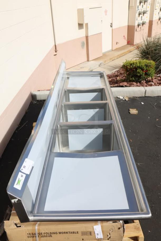 Regency Spec Line PCS3C162014-24LR stainless steel sink, three compartments, 100", with dented backsplash, new condition.