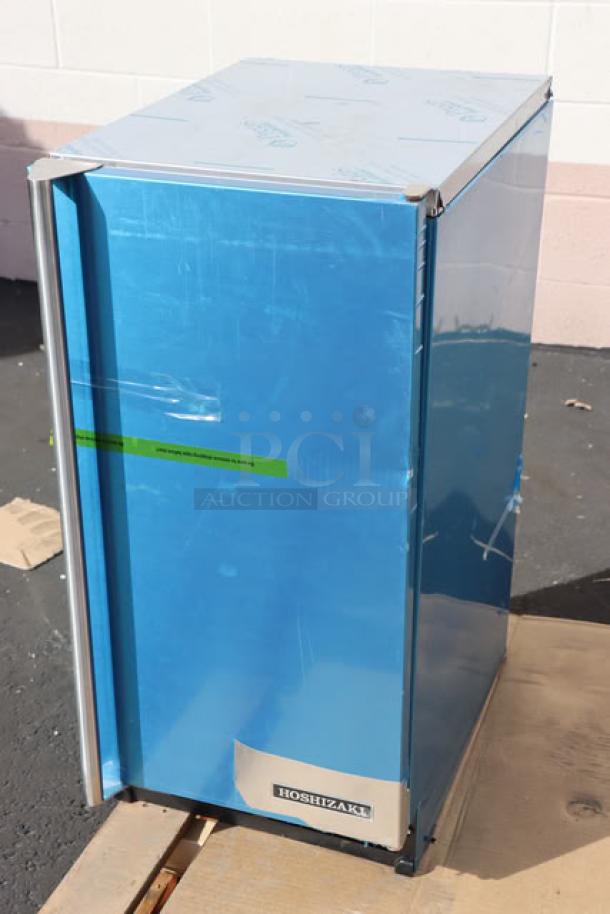 BRAND NEW Hoshizaki AM-50BAK-AD ice machine, 27 lb. bin, 54 lb. capacity. Scratch-n-dent, blue protective wrap visible, ADA compliant.