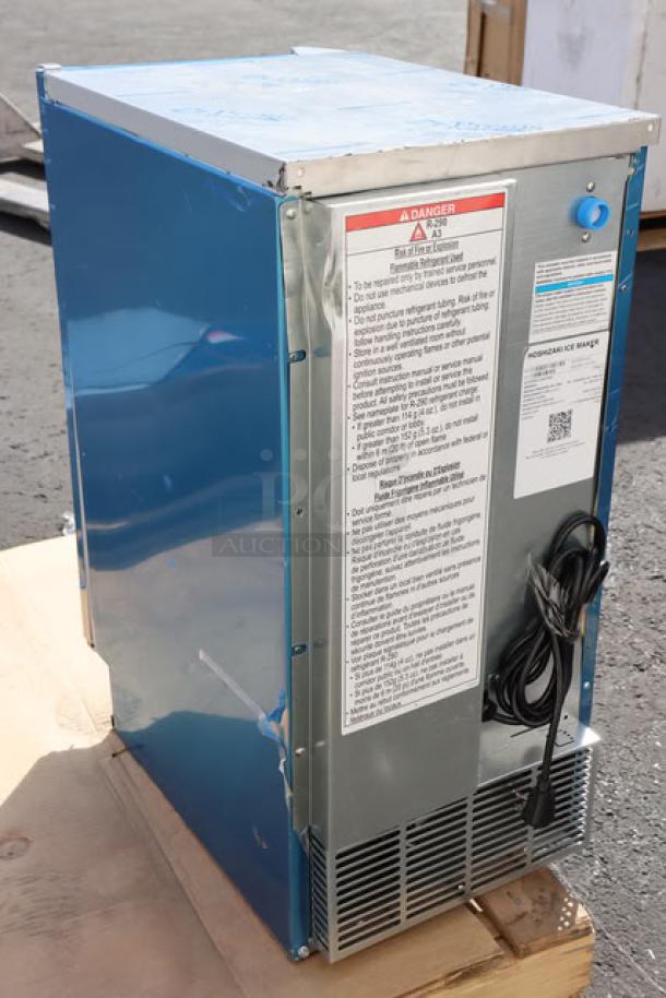 BRAND NEW 2025 Hoshizaki AM-50BAK-AD undercounter ice machine, scratch-n-dent, 54 lb. capacity, ADA compliant, with tags showing model and warnings.