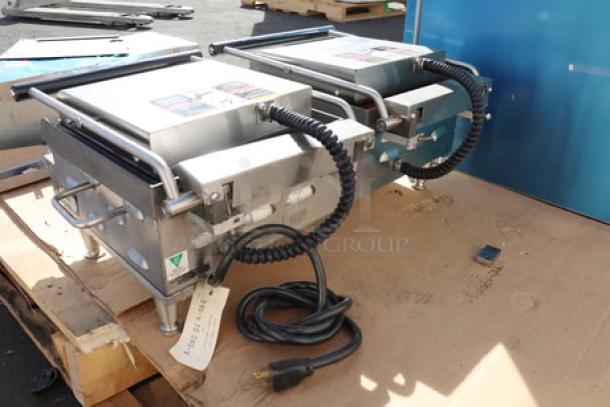 "Star Grill Express GX20IG-240V sandwich grill, dual 10x10 grooved cast iron plates, minor rust, S/N: GXG200223C0976, 208/240V."