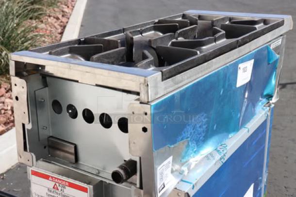 Brand new Avantco Chef Series CAG-R-2-12 gas range, 12" 2 burner, 50,000 BTU. Scratch-n-dent condition. S/N: 1016445000049.