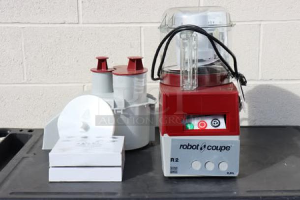 Robot Coupe R2NCLR food processor, 3 Qt. clear bowl, continuous feed, 2 discs, 1 hp, brand new scratch-n-dent, out of box.