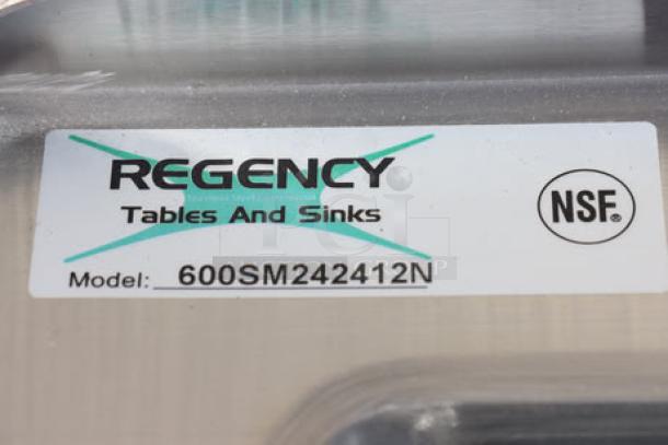 Regency stainless steel mop sink, model 600SM242412N, notched front. New, scratched, original packaging damaged.