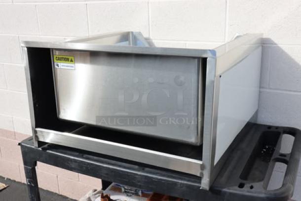 Brand new Regency 16-gauge stainless steel one-compartment mop sink, model 600SM242412N; 24"x24"x12" bowl, minor scratches.