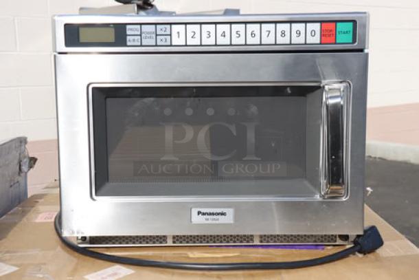 Panasonic NE-21523 stainless steel commercial microwave oven, 2100W, new condition, keypad controls, S/N: 6C33080025.