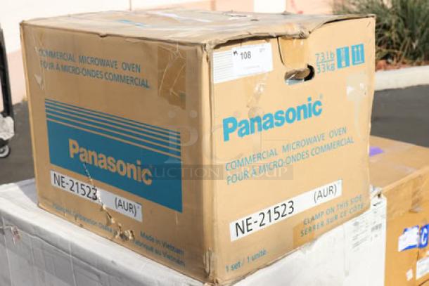 Boxed Panasonic NE-21523 stainless steel commercial microwave oven, 208/240V, 2100W. Serial number 6C33080025. Brand new.