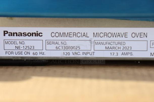 Panasonic NE-21523 Stainless Steel Commercial Microwave Oven, 2100W, 208/240V. Serial No: 6C33080025. Model label visible.