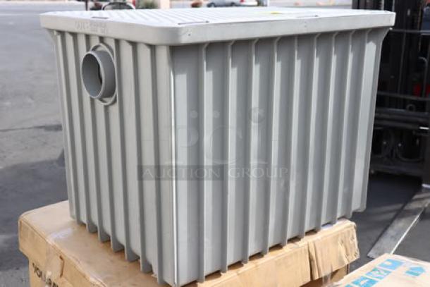 BRAND NEW Endura 3950A04 grease trap, 100 lb. capacity, 50 GPM, with 4" hub. Gray, out of original packaging, pristine condition.