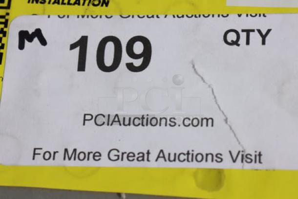 "Label indicating '109 QTY,' with website 'PCIAuctions.com' and auction site details, on yellow background."