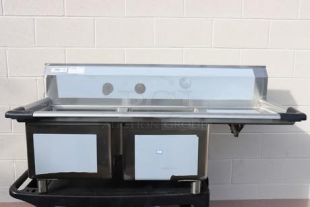 Brand new Regency 600S2171718R 57" two-compartment stainless steel commercial sink with right drainboard, 16 gauge.
