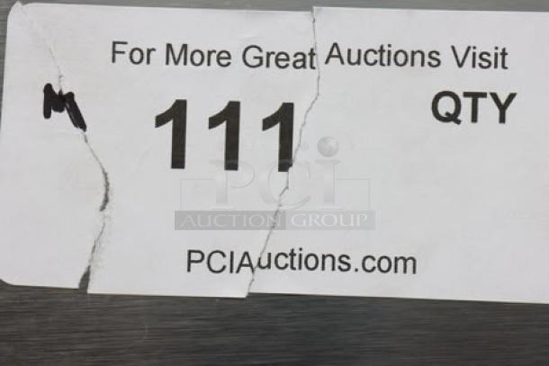 Torn auction label with text "For More Great Auctions Visit PCIAuctions.com, 111 QTY".