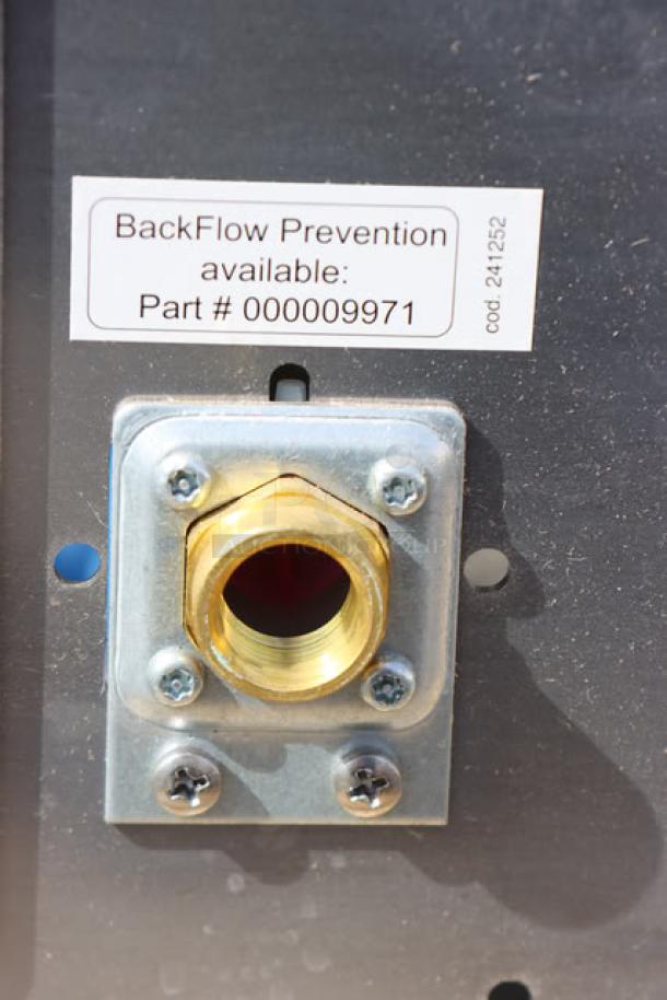 Brand new Manitowoc air-cooled ice machine with scratch-n-dent. Backflow prevention part #000009971 shown.