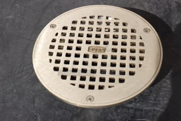 BRAND NEW Zurn Elkay ZN400-6B 6" round strainer, polished nickel bronze, heel-proof square openings, model label visible.