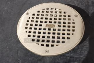 BRAND NEW Zurn Elkay ZN400-6B 6" round strainer, polished nickel bronze, heel-proof square openings, model label visible.