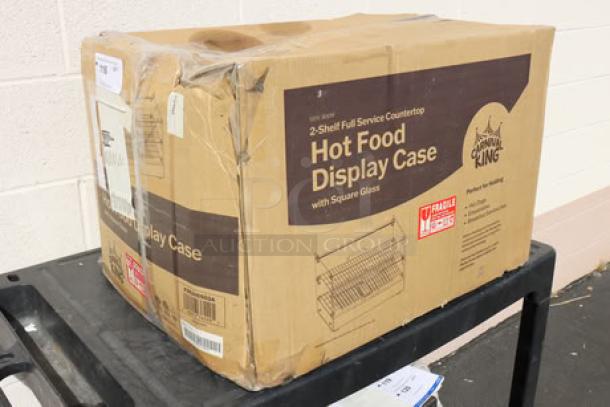 Carnival King HDCG2A Hot Food Display Case, 2 shelves, 120V, 800W, silver, curved glass. Original packaging damaged.