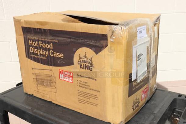 Carnival King HDCG2A hot food display case in damaged original packaging, marked fragile; features 2 shelves, 120V, 800W.