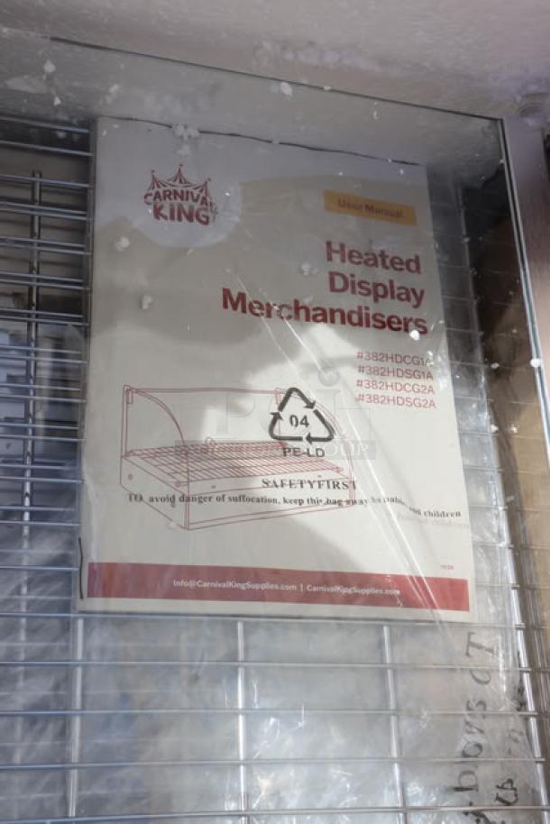 Brand new Carnival King HDCG2A hot food display case, silver, curved glass, 2 shelves, 120V, 800W. Original packaging damaged.