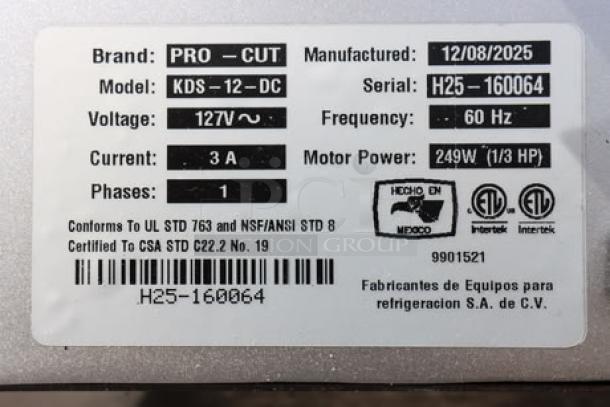 BRAND NEW! 2025 ProCut KDS-12 12" Meat Slicer, 127V, 1/3 HP, S/N: H25-160064, tag shows specs and certifications.