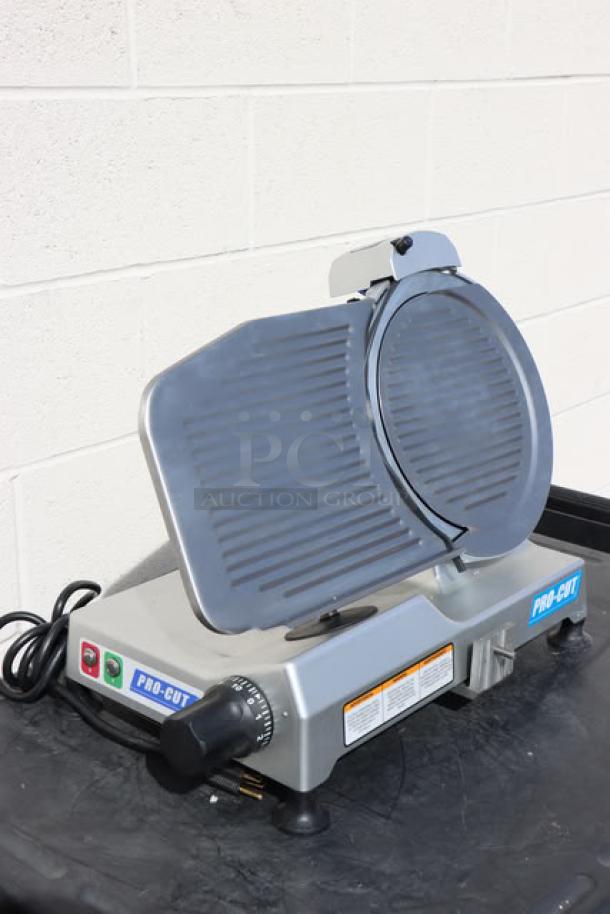 BRAND NEW! 2025 ProCut KDS-12 12" meat slicer, 127V, 1/3 HP. S/N: H25-160064. Out of packaging; may be missing small parts.