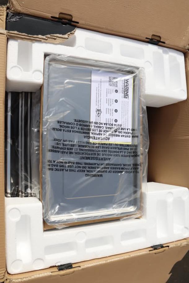 Brand new Waring WCO500X convection oven, 120V, 1700W, in open box with damaged packaging.