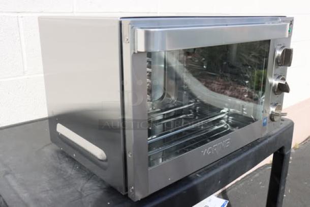 Waring WCO500X half-size countertop convection oven, brand new, stainless steel, 120V, 1700W, visible dials, intact glass door.