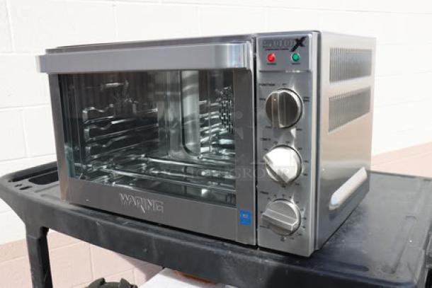 Brand new Waring WCO500X half-size countertop convection oven, 120V, 1700W; packaging damaged.