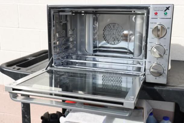 Waring WCO500X Half Size Countertop Convection Oven, 120V, 1700W, new, packaging damaged, stainless steel finish.