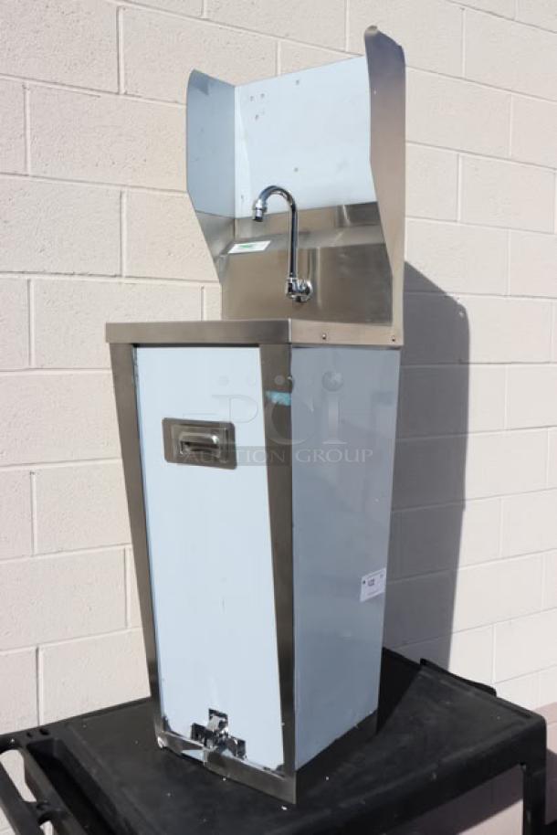 Brand new Regency 600HS17FPB 17" x 15" hands-free hand sink with pedestal base, stainless steel, scratch-n-dent condition.