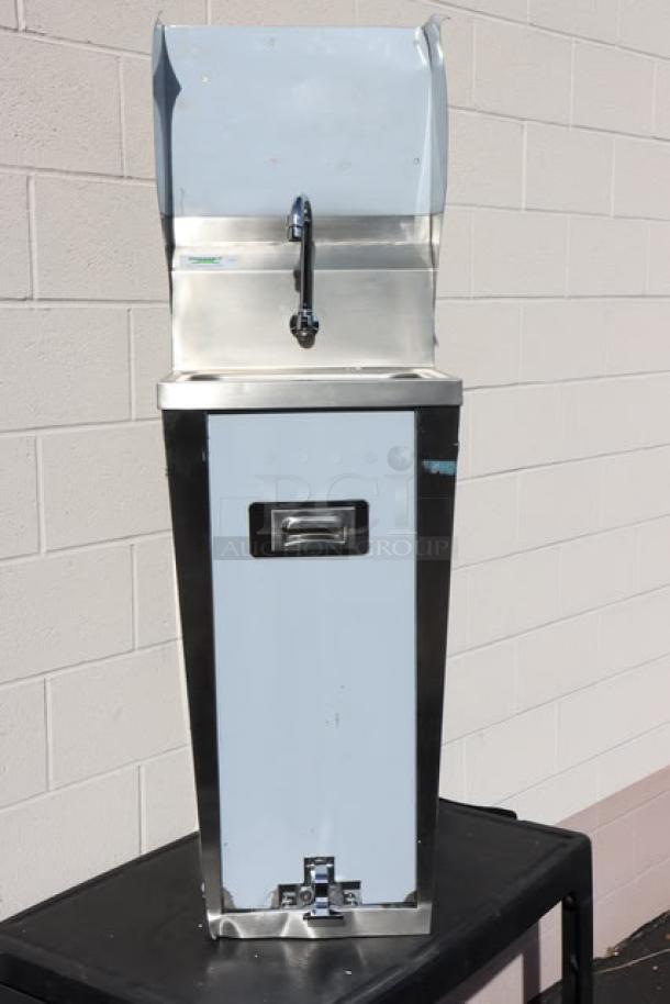 Brand new Regency 600HS17FPB 17" x 15" hands-free hand sink with pedestal base, minor scratches, stainless steel finish.