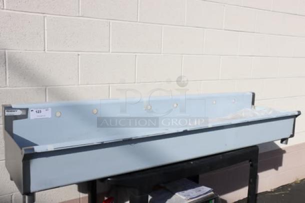 Regency 600FHDMS1872 72" x 17.5" stainless steel hand sink, new with minor scratches, for (3) 8" center faucets.