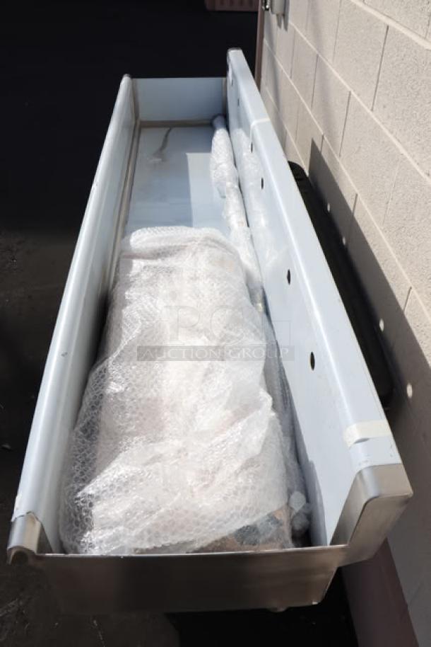 Brand new Regency 600FHDMS1872 hand sink, 72"x17.5", for three 8" center faucets. Scratch-and-dent condition.