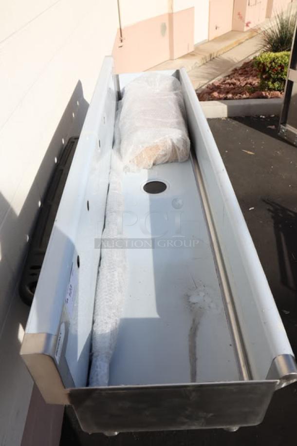 Brand new Regency 600FHDMS1872 72"x17.5" hand sink, designed for three 8" center faucets. Minor scratches visible.