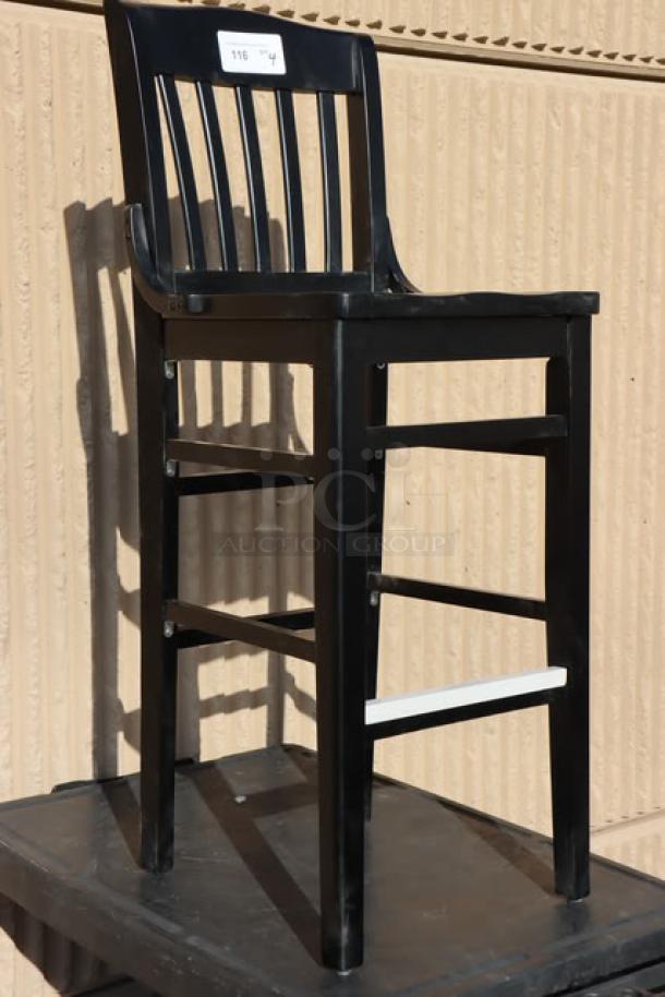 Brand new Lancaster Table & Seating bar height barstool, wood construction, black finish, model Bar Stools, minor scratches.