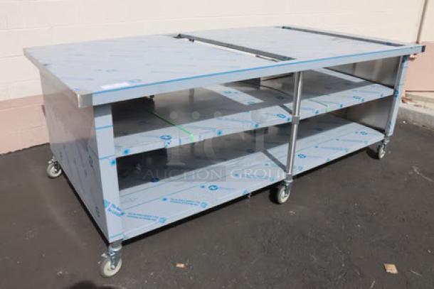 Domino's Pizza 8ft "CUTTING EDGE" table, brand new, bent middle, damaged brackets, center shelf, on commercial casters.