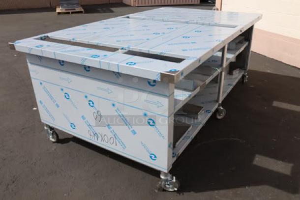 BRAND NEW Duke Domino's "CUTTING EDGE" 8ft table on commercial casters. Table with 2 slots, center shelf, some bending and bracket damage.