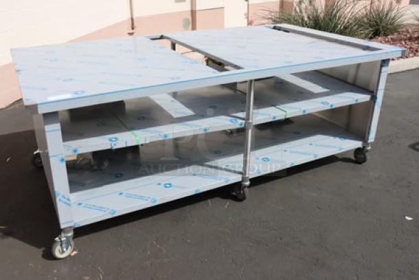Domino's Pizza 8ft "CUTTING EDGE" table with center shelf, commercial casters, 2 slots, storage dividers, bent middle, damaged brackets.
