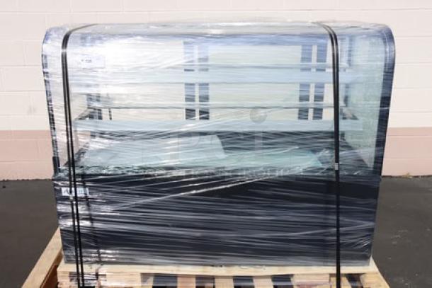 Avantco BC-60-HC bakery display case with curved glass, black finish. Glass is broken. Model BC-60-HC-30M-2, S/N: 1749008100007.