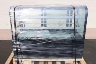 Avantco BC-60-HC bakery display case with curved glass, black finish. Glass is broken. Model BC-60-HC-30M-2, S/N: 1749008100007.