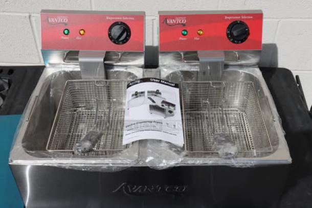 Brand new Avantco F102 dual tank electric countertop fryer, 20 lb. capacity, 120V, 3500W, out of original packaging with manual.