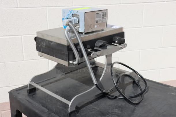 Krampouz WECCBEAT 4" x 6" Brussels Swivel Waffle Maker, 208V, 2600W, stainless steel, out of packaging, new condition.