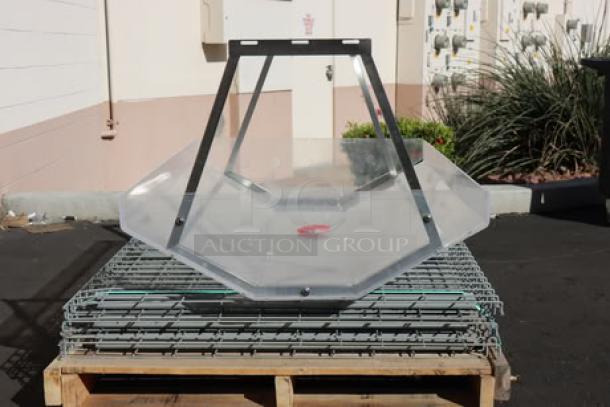 BRAND NEW ServIt 423ST4B1SC sneeze guard for 4-pan steam tables. Features two-sided design. Chipped front right corner.