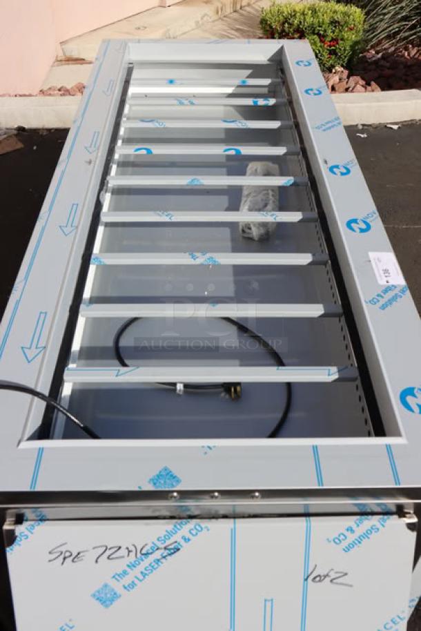 Beverage-Air SPE72HC-S refrigerated salad bar, 72" stainless steel. 115V, 5.4A, minor dent on right panel. Serial: 15509851.