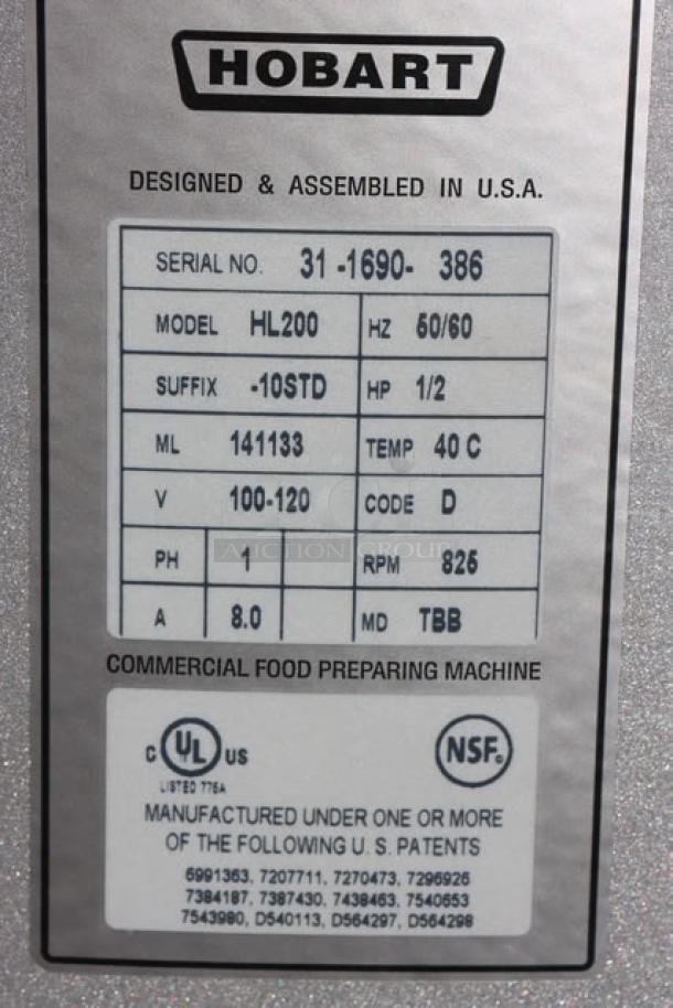Hobart Legacy+ HL200-10STD mixer, near-perfect condition, minor scratches and denting, labels show model and serial number.
